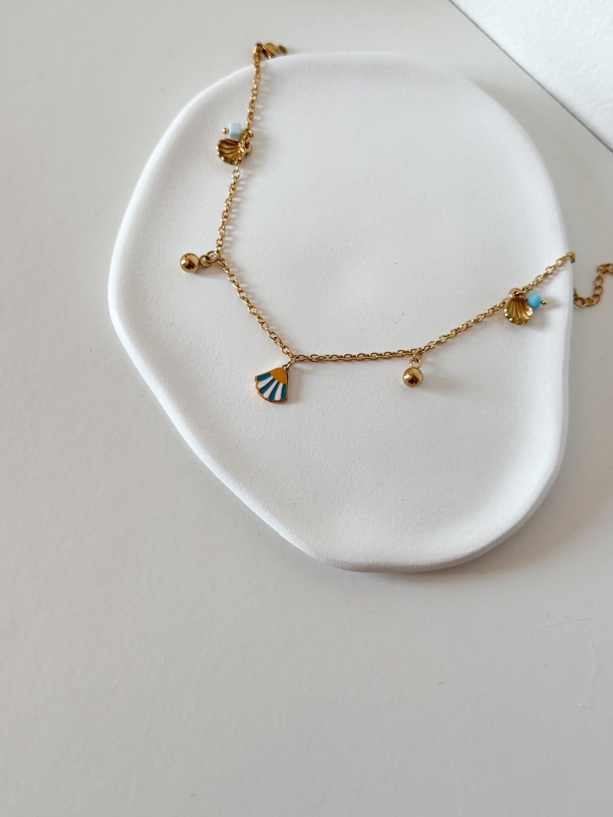 Pulseira de Pé Concha Azul