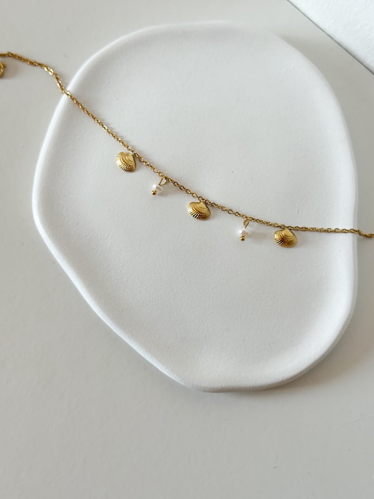 Pulseira de pé Conchinhas